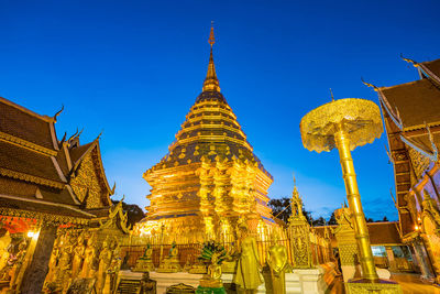 Low angle view of temple against building