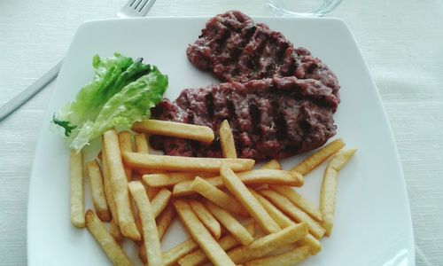 Close-up of served food in plate