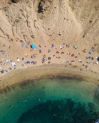 Aerial view of people enjoying at beach