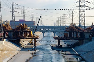 View of bridge over river in city