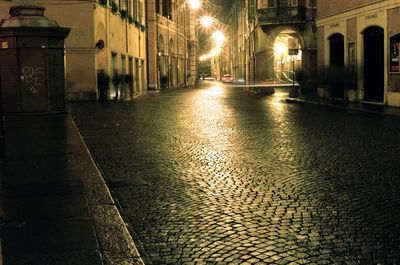 Illuminated buildings in city at night