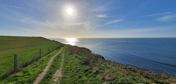 Scenic view of sea against sky during sunrise 