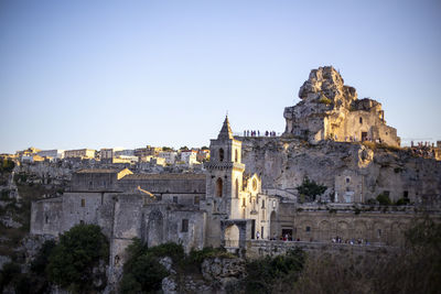 Historic buildings against clear sky