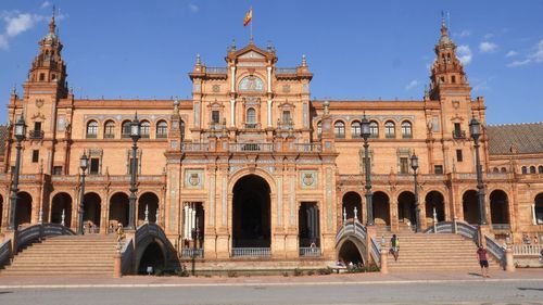 Facade of historic building against clear sky
