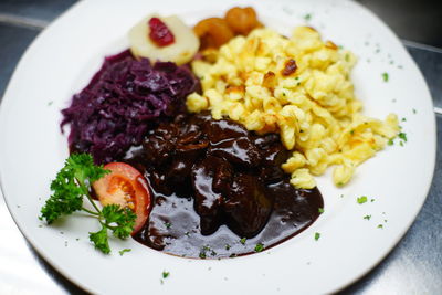 High angle view of breakfast served in plate