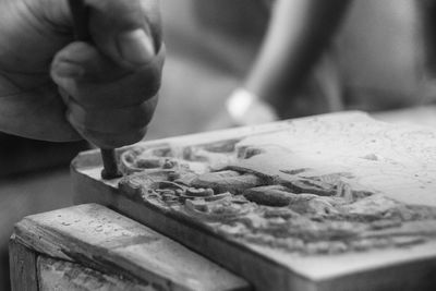 Close-up of person working