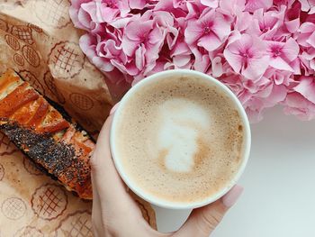 Directly above shot of coffee cup on table