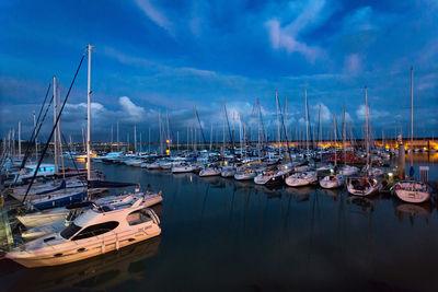 Boats moored in harbor