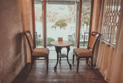 Empty chairs and tables at home