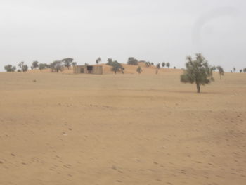 Scenic view of desert against clear sky