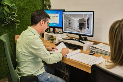 Young man working in his studio