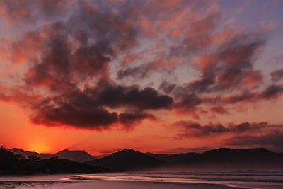 Scenic view of mountains at sunset