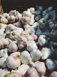 High angle view of garlic in crate