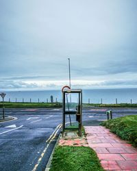 Empty road against sky