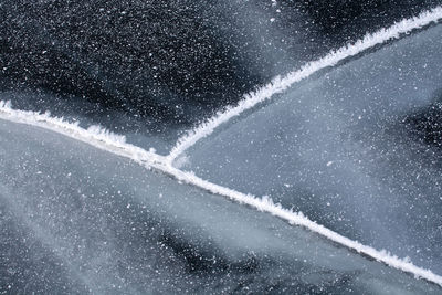 Aerial view of vapor trails in winter