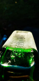 Close-up of water drops on metal