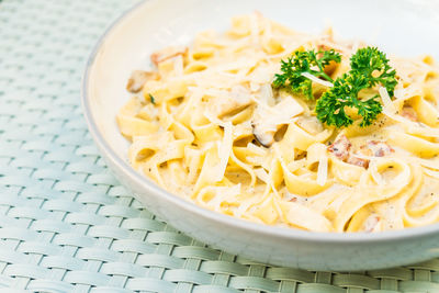 Close-up of pasta in plate on table