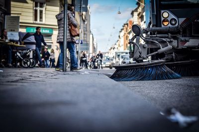 Street sweeper in city