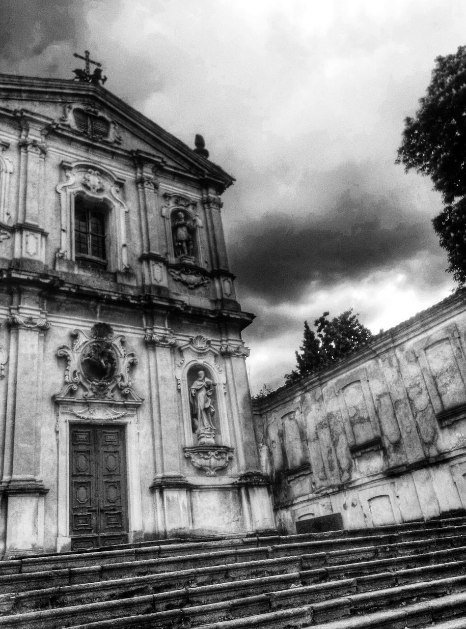 architecture, building exterior, built structure, sky, cloud - sky, low angle view, old, cloudy, history, cloud, building, day, historic, outdoors, facade, no people, overcast, weathered, steps, the past