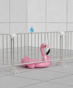 Surreal urban summer environment. heat. composition with inflatable ring for swimming. city life. 
