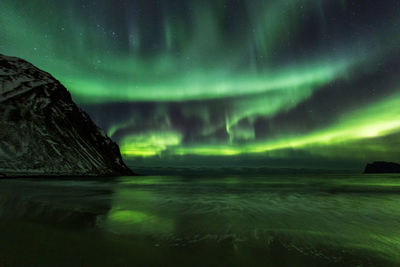 Scenic view of sea against sky at night