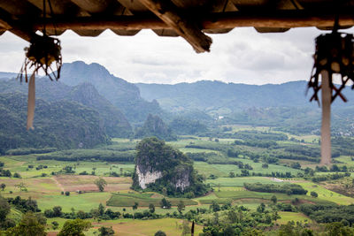 Scenic view of agricultural field against mountains