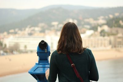 Rear view of woman looking at view