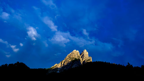 Amazing magic light phenomena where the last rays of light raises upon the italian dolomites.