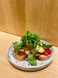 High angle view of salad in plate on table