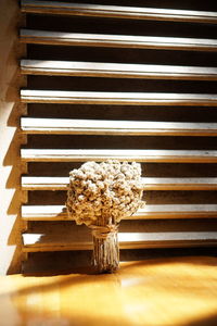 Close-up of white flower vase on table