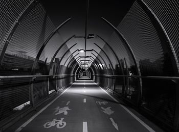 Empty road in city at night