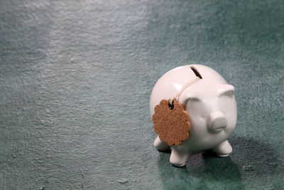 Close-up of piggybank on table