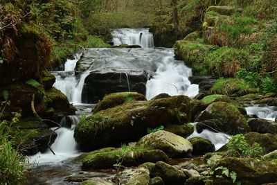 Long exposure of a waterfall at watersmeet in devon 