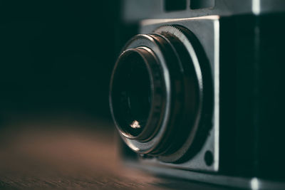 Close-up of camera on table