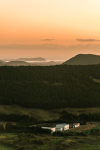 Scenic view of landscape against sky during sunset