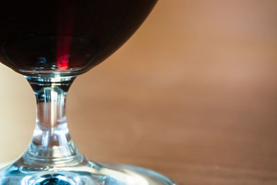 Close-up of beer glass on table