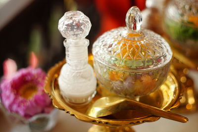 High angle view of ice cream in glass container on table