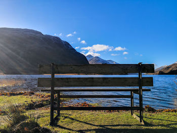 Scenic view of landscape against blue sky