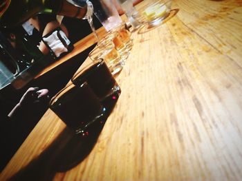 High angle view of wine glass on table