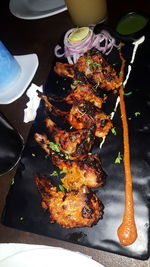 Close-up of meat on barbecue grill