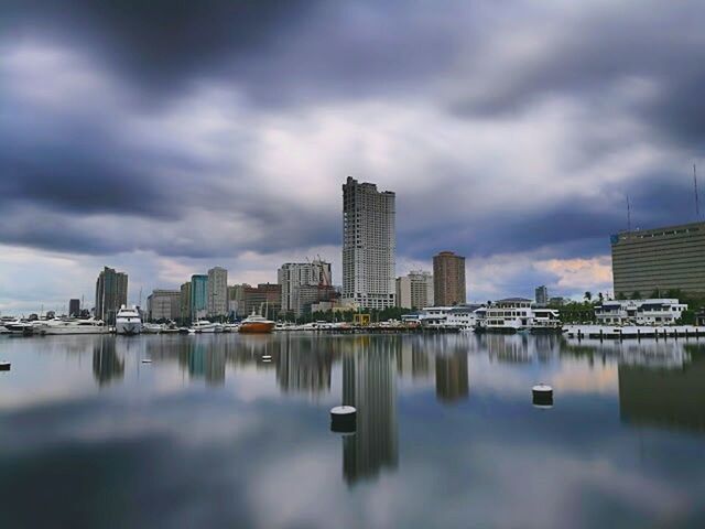 REFLECTION OF CITY IN WATER