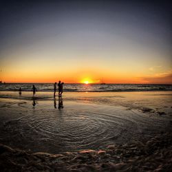 Scenic view of sea at sunset