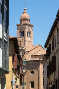 Low angle view of buildings against clear sky