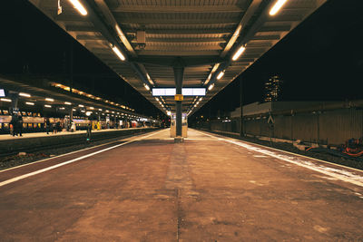 Illuminated railroad station platform