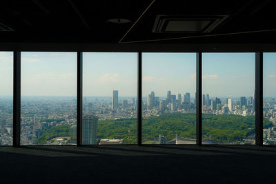 Low angle view of silhouette buildings against sky