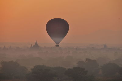 Hot air balloon in forest