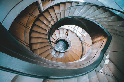 Directly below shot of spiral staircase in building