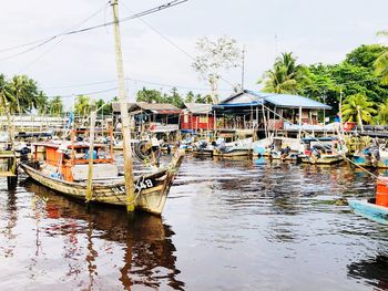 Boats moored at dock