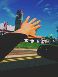 Cropped image of man holding road