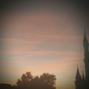 Silhouette of city during sunset